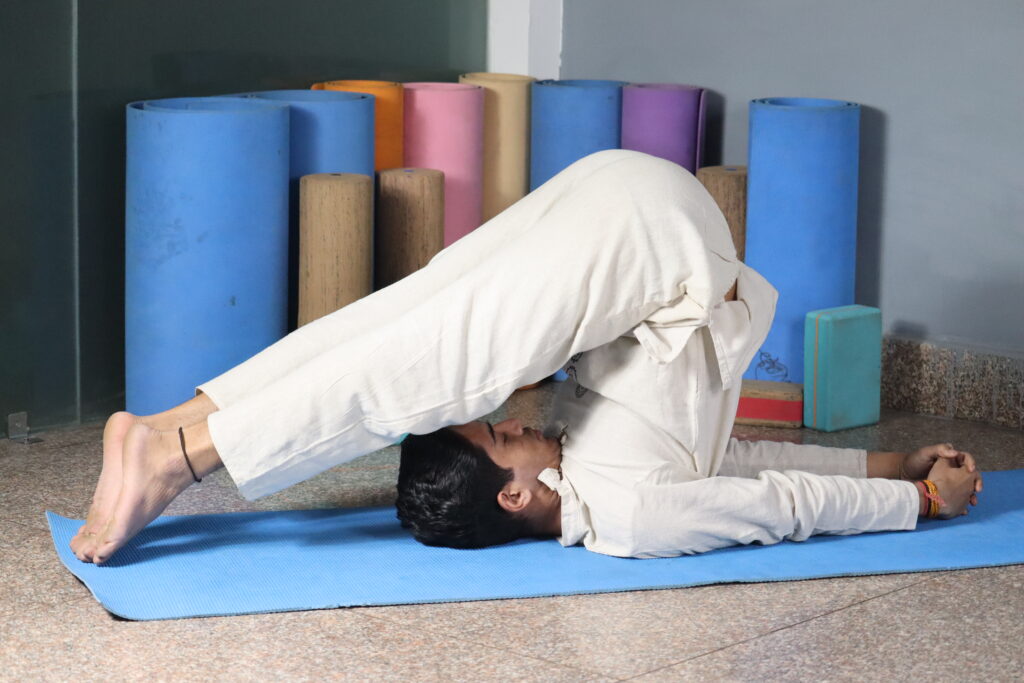 Certified instructor guiding 200 hour yoga teacher training session