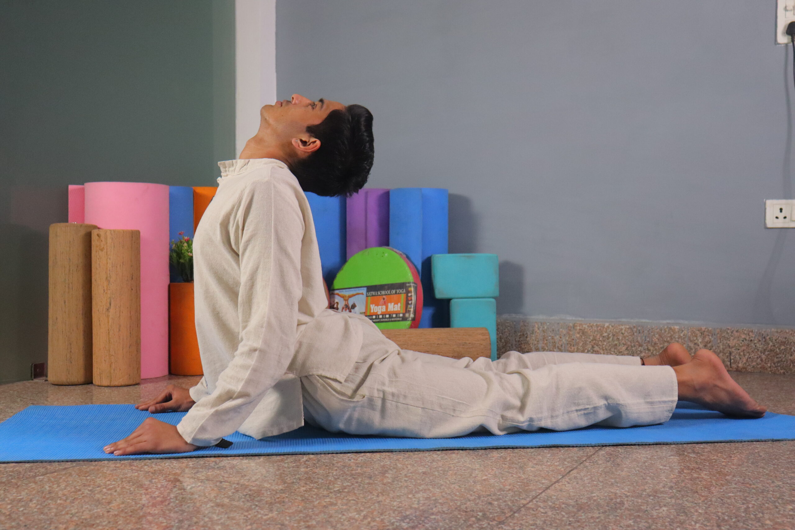 Experienced instructors practicing at Yoga Studio